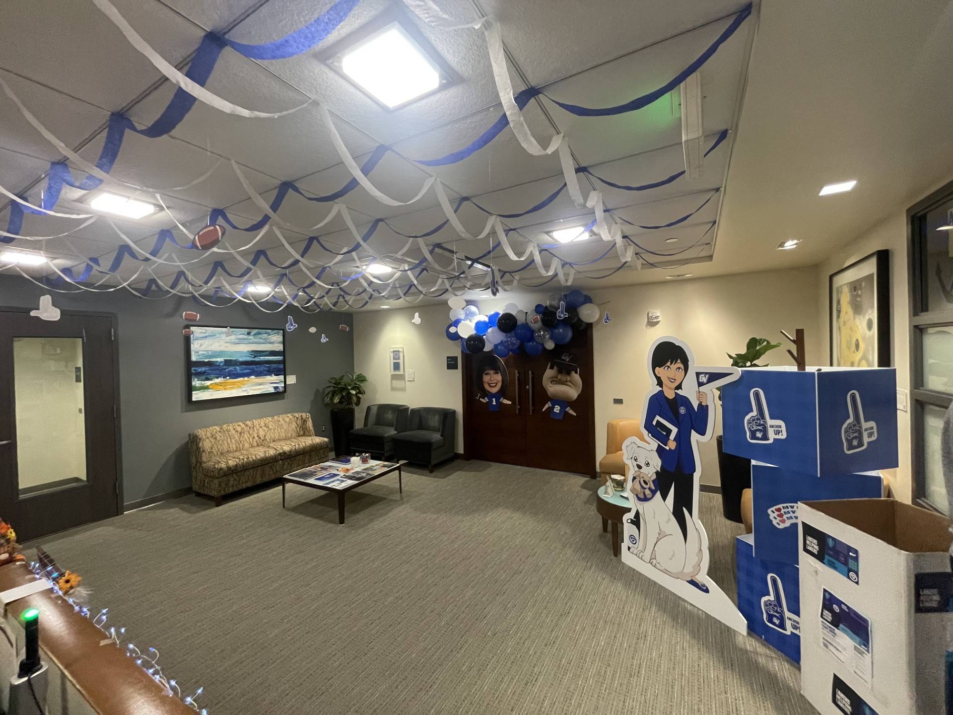 President's Office Homecoming decor, streamers hanging from ceiling
